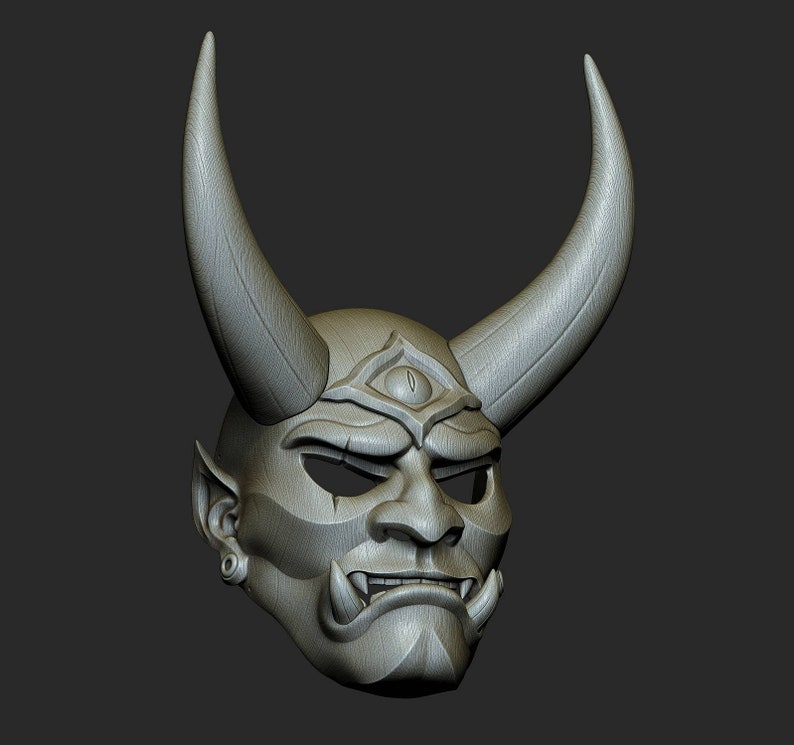 May include: A grey, detailed, 3D printed Oni mask with horns and a single eye. The mask has a textured surface and a fierce expression.