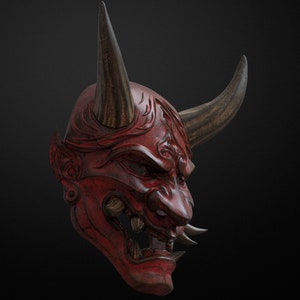 May include: A red wooden Japanese Oni mask with black horns and intricate carvings. The mask has a fierce expression with sharp teeth and a wide open mouth.