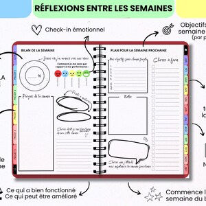 May include: A spiral-bound planner open to a two-page spread titled REFLEXIONS ENTRE LES SEMAINES. The left page features a weekly review, emotional check-in, and progress tracker. The right page includes a plan for the next week, task lists, and notes sections with colorful monthly tabs.