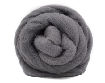 May include: A large ball of charcoal gray wool yarn. The yarn is soft and fluffy, and it is perfect for knitting or crocheting.
