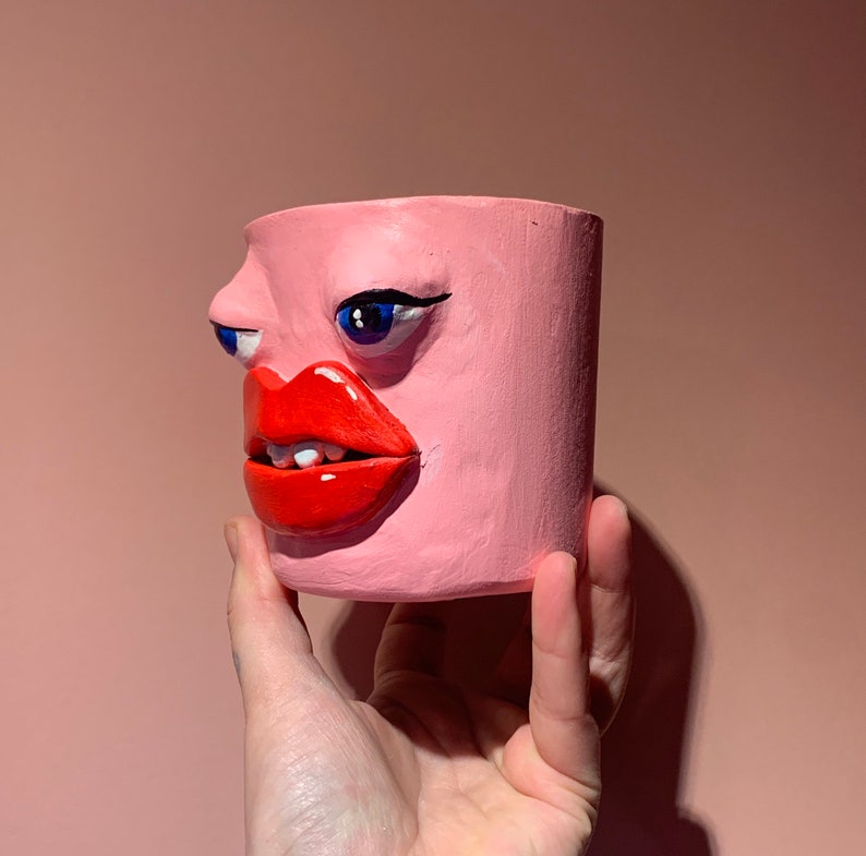 Quirky strange head face pot pink eyes and lips weird art image 3