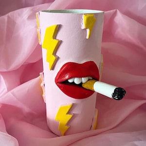 Tacky quirky funky lightening bolt pink lips pot with cigarette