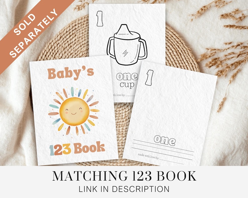 May include: A printable 123 book for babies featuring a sun with a smiling face and the text "Baby's 123 Book". The book includes a matching page with a picture of a cup and the text "one cup".
