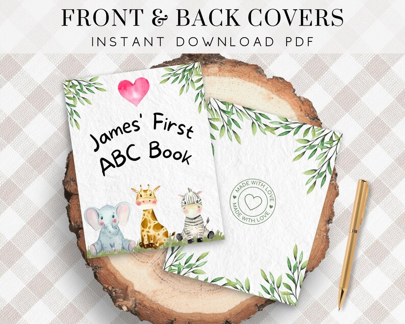 May include: Printable front and back covers for a personalized ABC book. The front cover features a pink heart, a giraffe, an elephant, and a zebra. The back cover has a green leafy border and a stamp that says "Made with Love". The text on the front cover reads "James' First ABC Book".