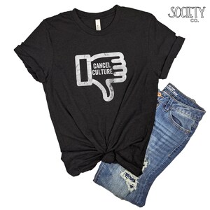 May include: Black t-shirt with a white thumbs down graphic and the text "Cancel Culture".