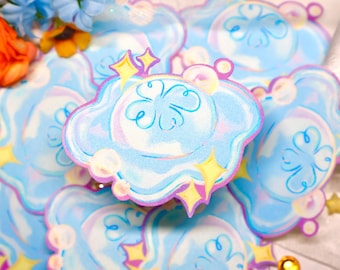 May include: A die-cut sticker featuring a light blue cloud shape with a central four-leaf clover outline, accented by yellow four-pointed stars and small bubbles, all outlined in a vibrant purple border with a subtle iridescent shimmer.