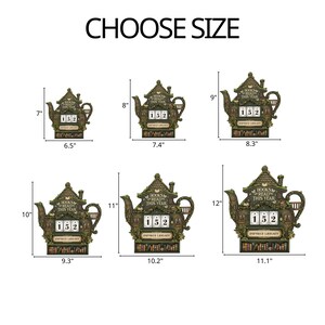 May include: A decorative teapot-shaped calendar with the text "BOOKS READ THIS YEAR" and the number "152". The calendar is brown and green, with measurements ranging from 7 inches to 12 inches in height.