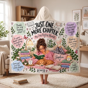 May include: A hooded blanket featuring a central illustration of a person reading with a dog, surrounded by stacks of books, plants, and text including "JUST ONE MORE CHAPTER" and "My Cozy Reading Blanket" along with various book-themed quotes.