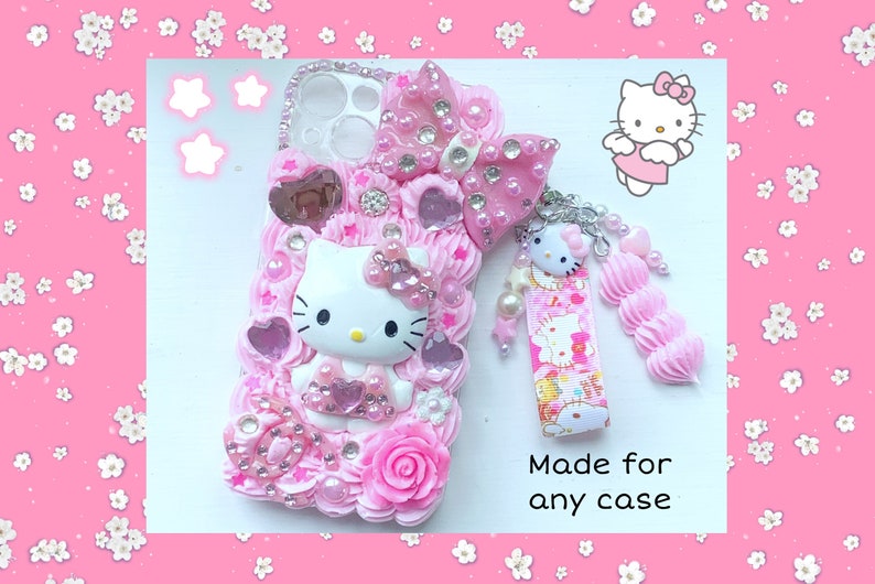 May include: A pink and white Hello Kitty phone case with a pink bow, rhinestones, and a Hello Kitty charm. The case is made for any phone. "Made for any case" is written on the image.
