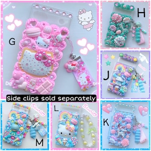May include: Ten different phone cases decorated with colorful 3D embellishments, including Hello Kitty characters, candy, and other cute designs. The cases are all clear and have a variety of colors and patterns. The text "Side clips sold separately" is visible at the bottom of the image.