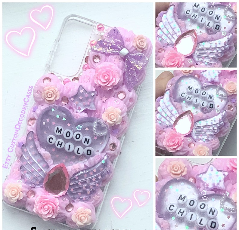 May include: A pink and purple phone case with a heart-shaped design and the words "Moon Child" in white letters. The case is decorated with glitter, stars, and flowers.
