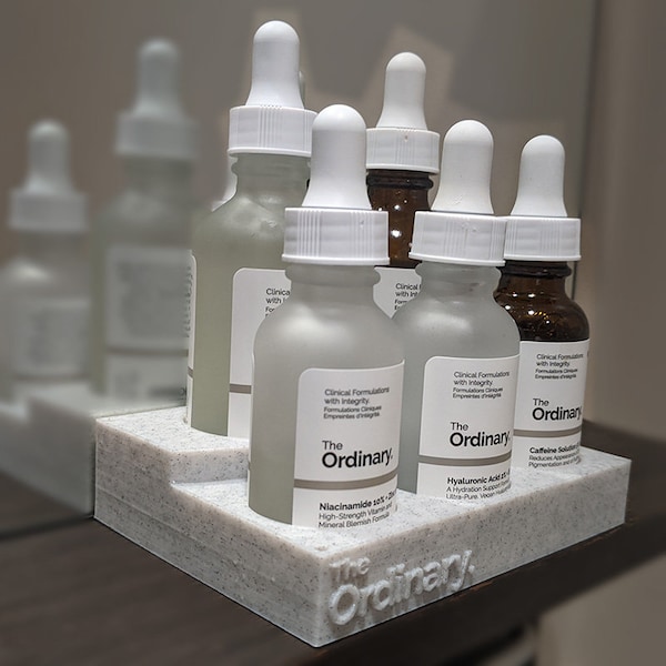 The Ordinary - Accessoire pour outil de présentation pour porte-bouteille