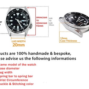 May include: A silver watch with a black face and silver hands. The watch has a black bezel with white markings. The watch is 37 mm in diameter and has a 20 mm lug width. The watch is 13 mm thick. The watch is 41 mm from spring bar to spring bar.