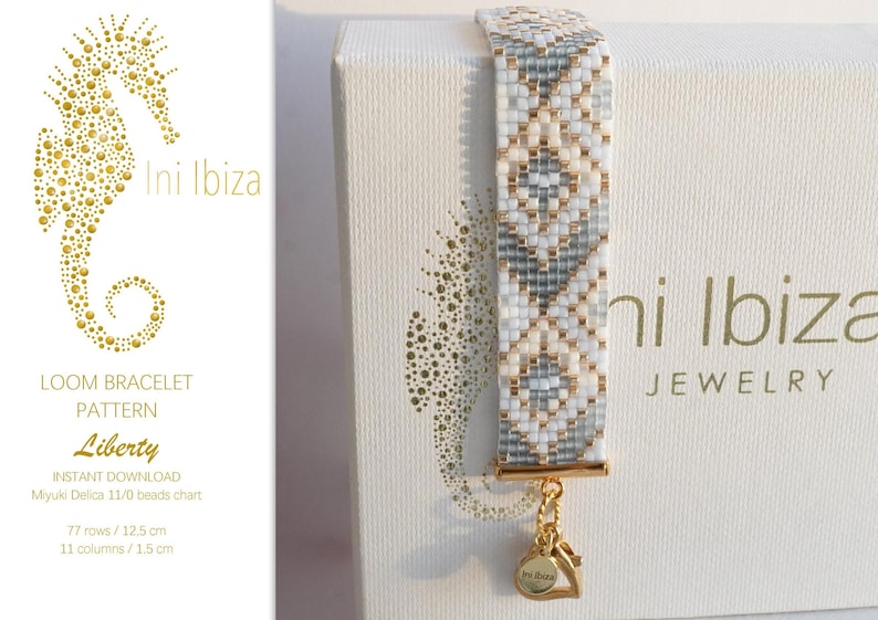 May include: A white and gray loom bracelet with a gold charm that says "Ini Ibiza" on a white box with the text "Ini Ibiza Jewelry" printed on it. The bracelet is 12.5 cm long and 1.5 cm wide.