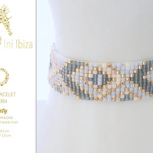 May include: A loom bracelet pattern called "Liberty" by Ini Ibiza. The pattern is for a beaded bracelet with a white, gray, and gold color scheme. The pattern is for a bracelet that is 12.5 cm long and 1.5 cm wide.