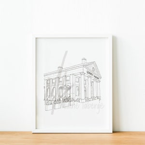 May include: Black and white line drawing of a building with the text "Quincy Market" above the entrance. The drawing is framed in a white frame.
