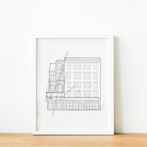 May include: Line drawing of a two-story building with a storefront. The building has a flat roof and multiple windows. The storefront has a large window and a door.