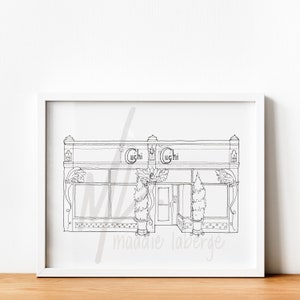 May include: A black and white line drawing of a storefront with the text "Cuchi Cuchi" above the entrance. The storefront has two large windows, a door, and two potted plants. The drawing is signed "maddie laberge" in the bottom right corner.