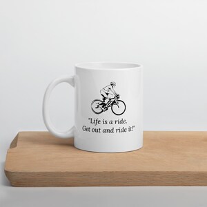 Life is a ride.  Get out and ride it! White glossy mug