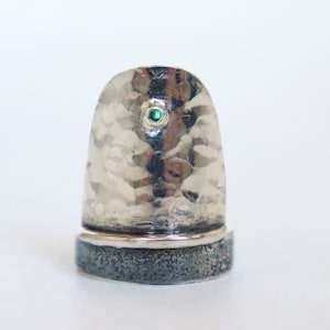 Hammered silver and emerald ring