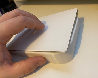 Apple Magic Trackpad 2 ergonomic holder for left & right-handed orientation.