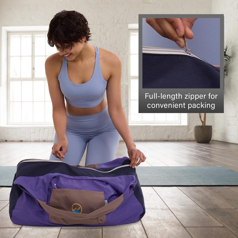 May include: A purple and navy duffel bag with a full-length zipper, shown open with a brown pouch in the front pocket. The bag is on a wooden floor, and the text "Full-length zipper for convenient packing" is visible.