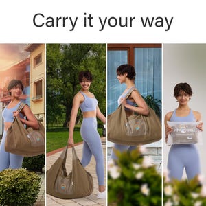 May include: A large, brown, unstructured fabric duffel bag with a wide shoulder strap and a small exterior pocket featuring a circular logo. The bag is shown in various carrying positions and is also displayed inside a clear plastic storage bag.