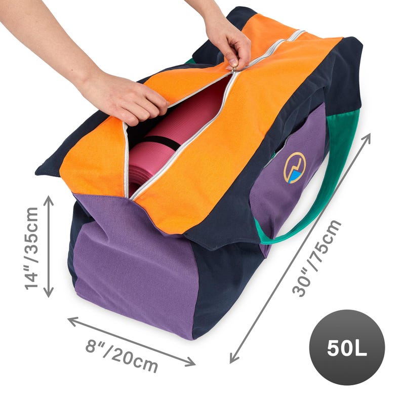 May include: Color-blocked yoga bag in orange, navy, purple, and green. The bag is open, revealing a pink yoga mat inside. The bag measures 30 inches long, 14 inches high, and 8 inches wide. A purple pocket features a logo. The bag has a 50L capacity.