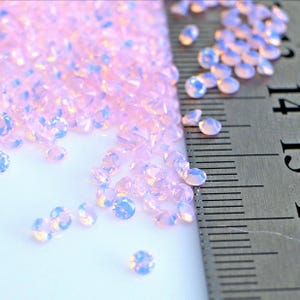 1.0-5.0mm Round Cut Milky Pink Nano Opal Heat Resistant Artificial Opal Crystal Nano Gemstones