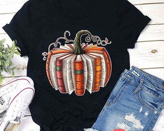 Pumpkin Book Teacher T-Shirt, Fall Halloween Teacher Shirt, Autumn Reading Tee, Spooky Season Classroom Outfit, Teacher Gift