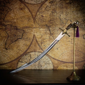 Epée en acier à poignée à décor koftgari or (shamshir), …