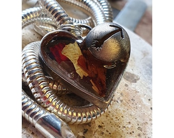 SPRZEDANE Naszyjnik w kształcie serca z motywem blokady