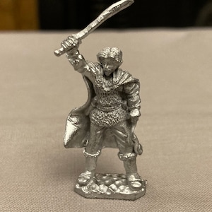 Pewter miniature swordsman with cape