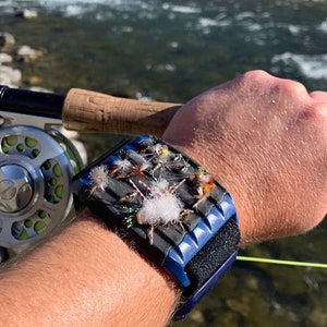 Patented fly fishing accessory, quickly access flies right on your arm with FlyBandz.