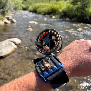 A fly fishing MUST HAVE! Easy on-arm access to your flies, change on the go without opening a fly box. Tested ripple foam secures your flies