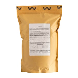 A brown resealable pouch with a white label that reads 'Application' and includes instructions for using worm castings for vegetables and annuals, perennials, seeds, seedlings and transplanting, and established plants. The label also includes a Guaranteed Lab Analysis table with information about the total nitrogen, available phosphate, soluble potash, water soluble nitrogen, total nitrogen, and ammoniacal nitrogen. The label also includes the company's logo and website address.