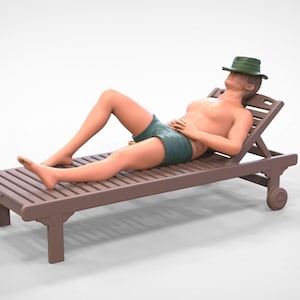 Figure of a of a Man sunbathing in the sun 138 in various sizes (  supplied with no sunbed and hat)
