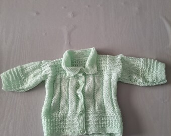 Baby's hand knitted cardigan