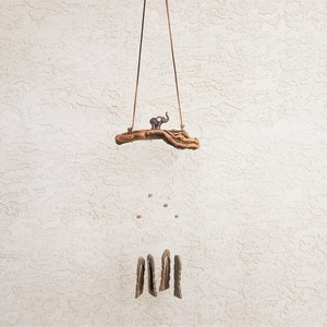 Colorado Windsongs | Elephant | wind chime | handmade | artisan | stoneware | earthenware | grapevine | wood | outdoor | guarantee