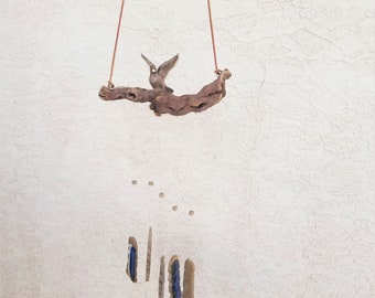 Colorado Windsongs | Bird | wind chime | handmade | artisan | stoneware | earthenware | grapevine | wood | outdoor | guarantee