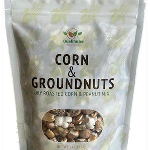 May include: A white bag of dry roasted corn and groundnuts. The bag has a clear window showing the mix of corn and peanuts. Text on the bag reads "CORN & GROUNDNUTS" and "NET WT. 1.4 OZ (40g)".