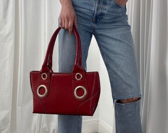 Vintage 90s Y2K Cherry Red Shoulder Bag Handbag with Contrast Stitching and Silver Grommet Details