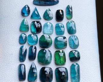 21 carats blue tourmaline rosecuts lot.