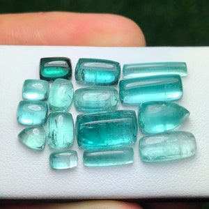 28.5 carats natural tourmaline cabochons lot. Paraiba colour loose tourmaline cabochons lot from Afghanistan.