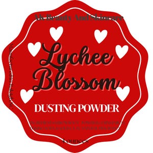 May include: A red label with a white border and white hearts. The label reads "Lychee Blossom DUSTING POWDER" in a decorative font. The label also includes the text "4 ounces".