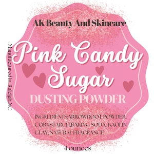 May include: Pink and white label with the text "Pink Candy Sugar Dusting Powder" and a pink glitter background. The label also includes the ingredients: arrowroot powder, cornstarch, baking soda, kaolin clay, and natural fragrance. The label states "4 ounces" and "Manufactured in: Raleigh, NC".