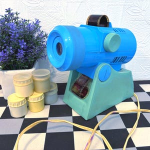 Collectible film projector,Rare, working film projector,Soviet Filmoscope ,Filmstrip, Filmstrip for children,Plus 5 filmstrips as a gift