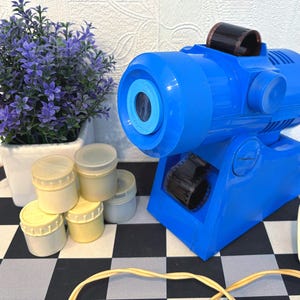 Collectible film projector,Rare, working film projector,Soviet Filmoscope ,Filmstrip, Filmstrip for children,Plus 5 filmstrips as a gift