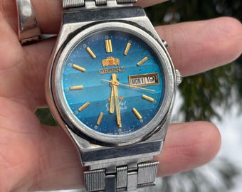 1970年代製ヴィンテージオリエント自動巻き腕時計、ゴールドトーン