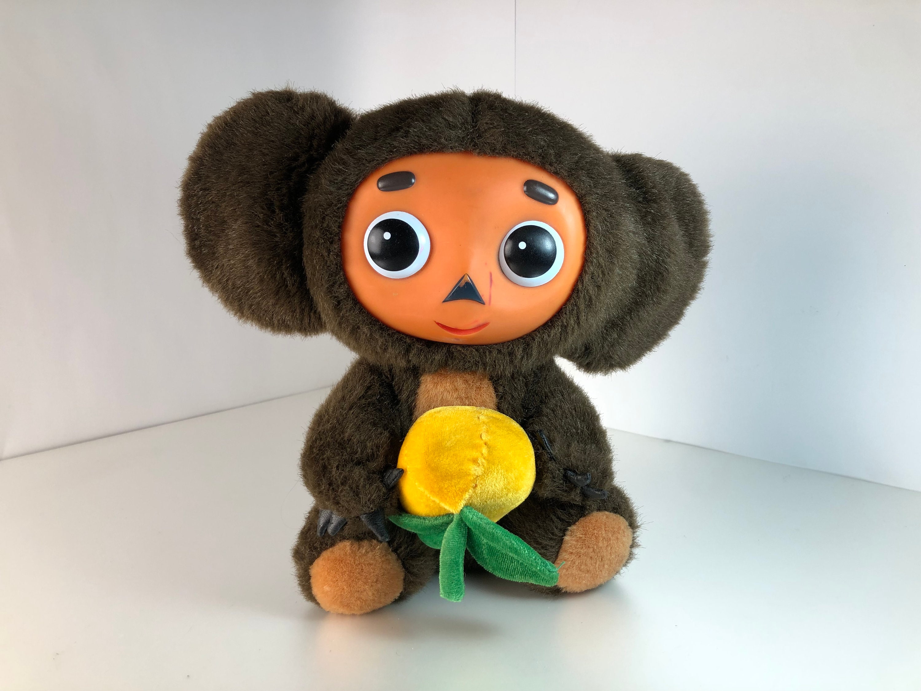 Baby Plush Toy Cheburashka With Big Ears On A Light Background Stock Photo,  Picture and Royalty Free Image. Image 16886910.